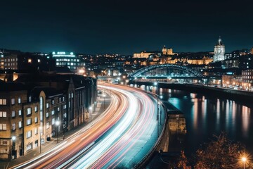 Aufkleber - Night cityscape with light trails on highway beside river and bridge.