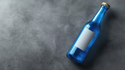 Poster - A sleek blue beer bottle with a blank label, placed on a grey surface, highlighting its elegance and ideal for custom branding mockups and presentations
