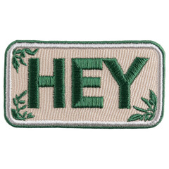 a rectangular embroidered patch featuring the word 