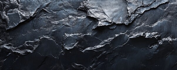 Poster - Dark grey slate background creating a natural rocky texture