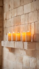 Canvas Print - Five lit candles on a brick mantelpiece.