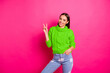 © deagreez - Portrait of cute nice lady showing making v-signs wearing knitted pullover isolated over pink bright background