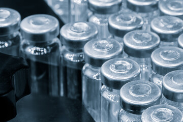 Poster - Glass ampoules for injection in a special container in a hospital or medical laboratory