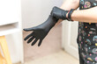 © Jezabel - close up of hands with surgical gloves,
