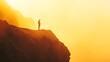 © zunitz - Solitary Figure Stands on a Cliff at Sunset