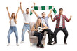 © Ljupco Smokovski - Group of young men and women watching football and cheering