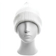 © Megla - White beanie hat on mannequin head, isolated on white background.