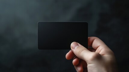 Poster - Elegant black gift card held in hand ready for personalization against a dark background. Generative AI