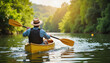© Ektala - Retired people traveling Man paddling canoe through lush green river landscape