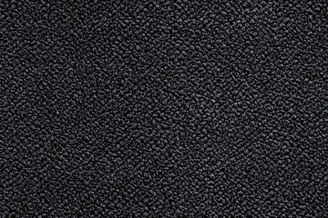 closeup view of black door mat. seamless pattern of black carpet