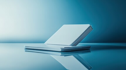 Poster - clean flat lay of password-protected notebook lying on smooth reflective surface under bright light