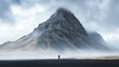 © Анатолий Сав - Lone figure stands in solitude at the base of a massive mountain under a cloudy sky. Generative AI