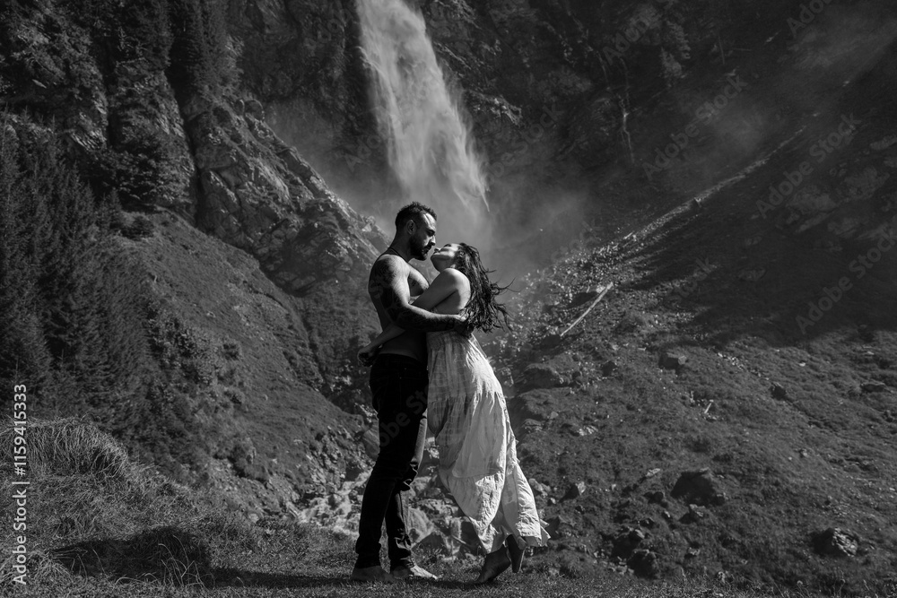 Sexy couple kissing on nature. Couple in erotic pose. Sexy models