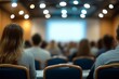 © Imagentive - Blurred Conference Hall Audience at Seminar Event