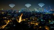 © SANDJAYA - Cityscape with Illuminated WiFi Symbols at Night