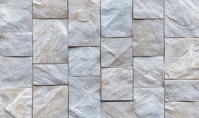 Poster - A close-up of textured stone tiles arranged in a pattern.