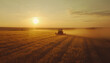 © Oleksiy - Harvester working in wheatfield at sunset. Harvest ripe wheat. Agriculture and farming
