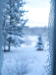 © Cody - Frost-covered windowpane with blurred winter scenery outside, creating an open central area for overlaying text