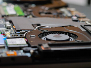 Aufkleber - Repearing Laptop ventilation cooling system. The inside of the laptop.