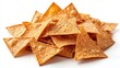 © we3_food - A pile of crispy, triangular tortilla chips isolated on a white background.