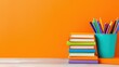 © Sansern - Creative home office still life bright orange school supplies