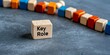 © Jullia - Key Role Concept with Wooden Blocks on Stone Background Leadership and Strategy in Business