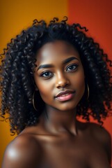 Wall Mural - Portrait of a Young Woman with Natural Curly Hair Against a Vibrant Background