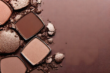 rushed shiny eye shadows in mocha brown color shades on a mocha brown solid color background for 2025