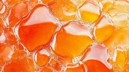 Poster - Vibrant Abstract Orange Gelatin Texture with Bubble Patterns and Reflections in Light