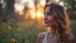© Irina - Portrait of young woman with curly hair enjoying sunset in blooming garden