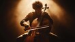 © musa - A young man sits playing a cello in a dramatic, low-lit setting.