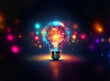 © joeycheung - A vibrant light bulb glows, filled with colorful energy and surrounded by bokeh lights.  It symbolizes innovation, creativity, and bright ideas.