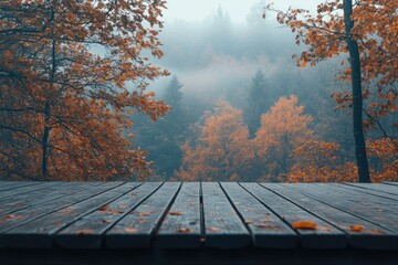 Wall Mural - Empty wooden table showing misty autumn forest landscape