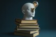 © Vii - A person's head with a lightbulb on top of a stack of books, possibly representing creativity or learning