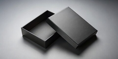 Poster - A black box with its lid slightly ajar, revealing the empty interior, sits on a textured gray surface.
