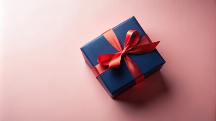 Poster - A single blue gift box with a bright red satin bow, perfectly centered on a soft blush pink background, radiating warmth and anticipation.