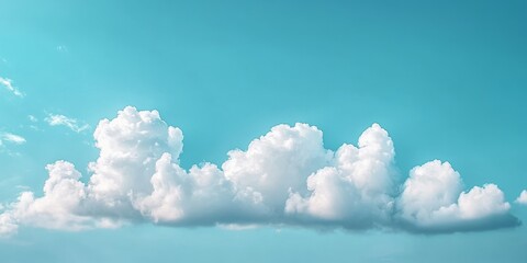Naklejka na meble Stunning image showcasing white clouds floating gracefully in a vibrant blue sky, capturing the essence of beauty in nature with white clouds against the serene blue backdrop.