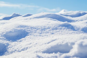 Poster - A close up view of a pile of fresh snow, perfect for winter scenes and cold weather photography