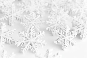Poster - A cluster of unique snowflakes resting on a pure white background