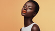 © Sacha - Stunning woman with bold orange lips and flawless makeup against warm orange background