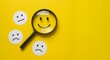 © PhotoMaster - User experience and feedback analysis concept with magnifying glass highlighting happy emoji on bright yellow background, emphasizing positivity.