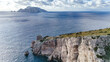© AShots - Aerial view of Punta Campanella in Massa Lubrense, with Capri in the distance. Amalfi Coast. Italy
