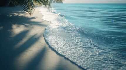 Wall Mural - Serene Beach Scene with Gentle Waves and Sunlit Sand, Perfect for Relaxation and Inspiration in a Tropical Paradise.