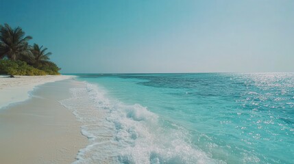 Wall Mural - Breathtaking Beach with Crystal Clear Water and Soft Waves Under a Bright Sky
