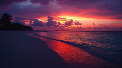 Wall Mural - A tranquil beach at sunset, showcasing vibrant pink and purple skies over calm waters and gentle waves. A serene escape for relaxation and peace.