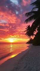 Wall Mural - Stunning sunset over a tranquil beach with palm trees silhouetted against the colorful sky. Experience the beauty of nature in this peaceful coastal scene.