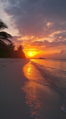 Wall Mural - Stunning sunset over the calm beach, reflecting golden hues on the water. The sky is painted with vibrant colors as the sun sinks below the horizon. A tropical paradise awaits.
