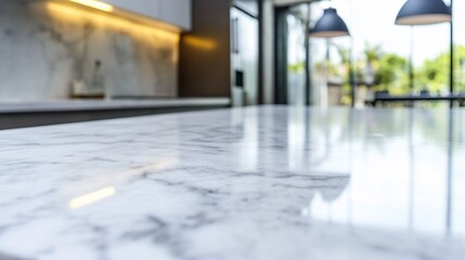 Poster - A close-up view of a polished marble countertop in a modern kitchen.