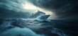 © EFA - A cruise ship navigating turbulent seas under a stormy sky.