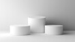 © chesleatsz - Three White Cylinders On A White Background